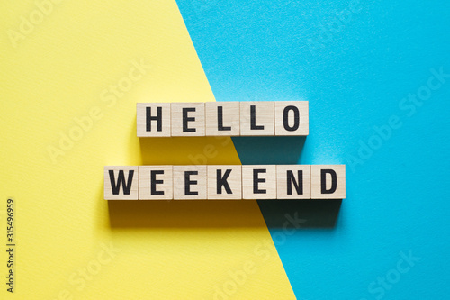 Hello weekend word concept on cubes