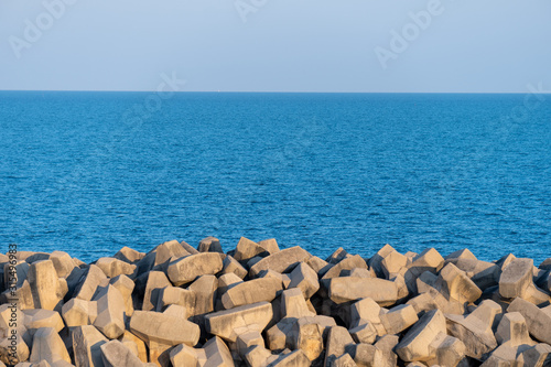 Wallpaper Mural Tetrapods breakwater, a structure in coastal engineering used to prevent erosion caused by sea wave and strong wind and protect ships in harbour