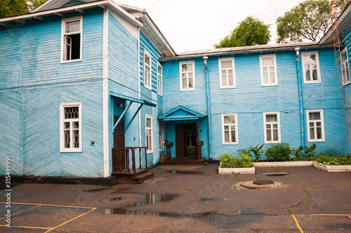 Russia, Blagoveshchensk, July 2019: the house-Museum of Sabina and blue wooden building in the summer