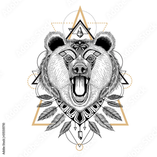 Hand drawn detailed roaring grizzly bear in aztec (ethnic) style