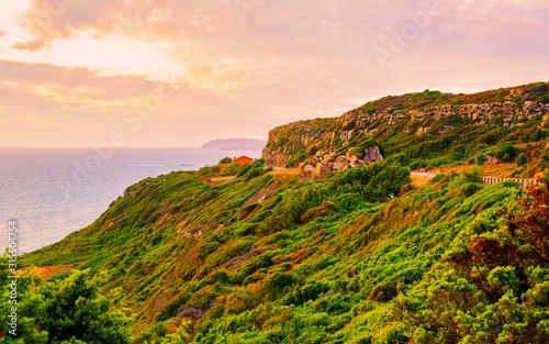 Landscape at Portoscuso and the coast of Mediterranean Sea at Carbonia-Iglesias, Sardinia, Italy. Scenery of Sardegna, summer. Cagliari province. Mixed media.