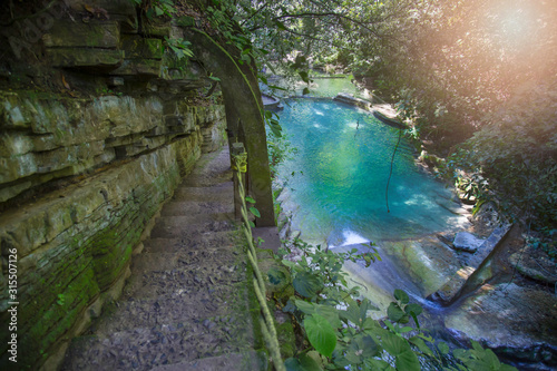 waterfall in surreal architecture beautiful old castle  beautiful structures  jungle and waterfalls in the surreal botanical garden of Edward James  Xilitla  San Luis Potos    Mexico