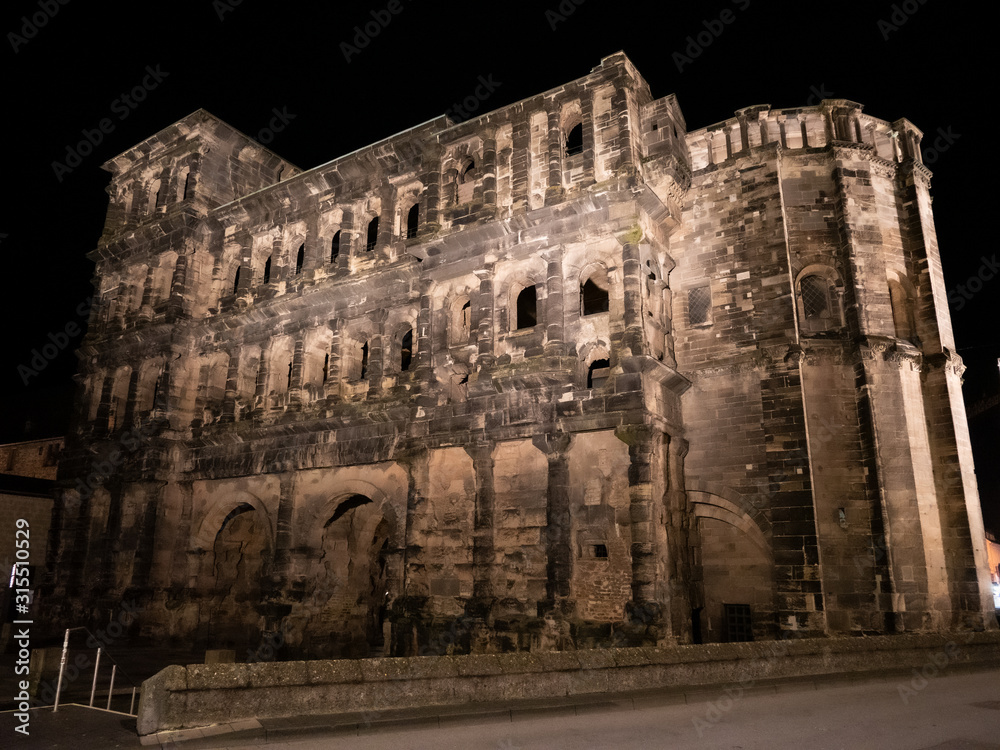 The Porta Nigra viewed from the town side by night.