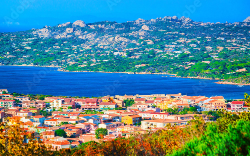 Panorama and landscape at La Maddalena of Costa Smeralda at Mediterranean sea in Sardinia island of Italy. Boats at Sardegna in summer. Olbia province. Mixed media.