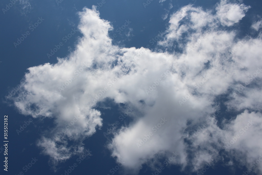 white Cumulus clouds in the blue sky natural white Cumulus clouds in the blue sky natural