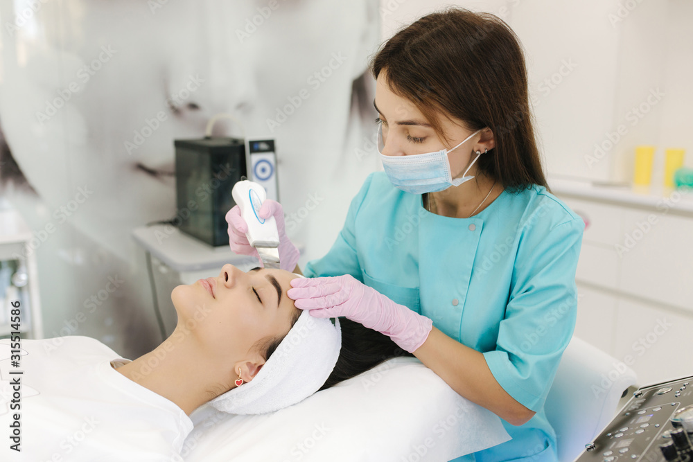 Young woman taking beauty procedure in spa salon Young woman taking beauty procedure in spa salon