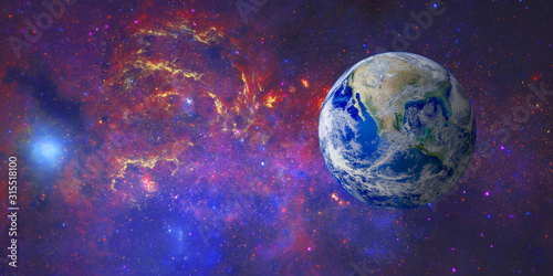 Fototapeta Naklejka Na Ścianę i Meble -  Blue planet earth in space. (Elements of this image furnished by NASA.)