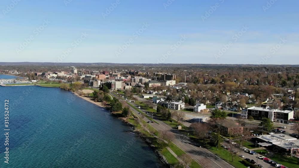 Traverse City in Northern Michigan Lake Michigan and the Grand Traverse Bay make Beautiful Scenery for Boats Sailing and Beach Front Property looking down roads with traffic trail system walkability Traverse City in Northern Michigan Lake Michigan and the Grand Traverse Bay make Beautiful Scenery for Boats Sailing and Beach Front Property looking down roads with traffic trail system walkability