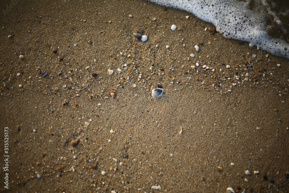 water drops on the sand water drops on the sand