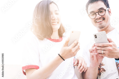 couple love concept.asian lover man and women taking a selfie while travelling on holiday hug each other.photo of people smile enjoy Beautiful romantic time