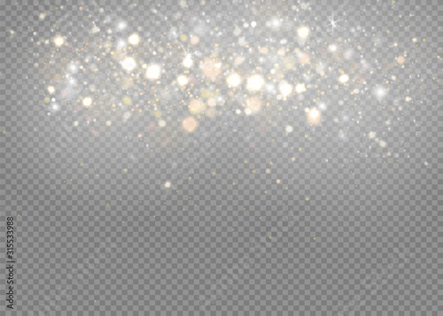 The dust sparks and golden stars shine with special light. Vector sparkles on a transparent background. Christmas light effect. Sparkling magical dust particles.