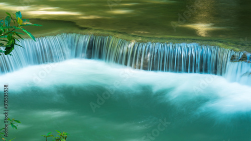 Closeup waterfall motion in deep jungle, Located Erawan waterfall Kanchanaburi province, Thailand