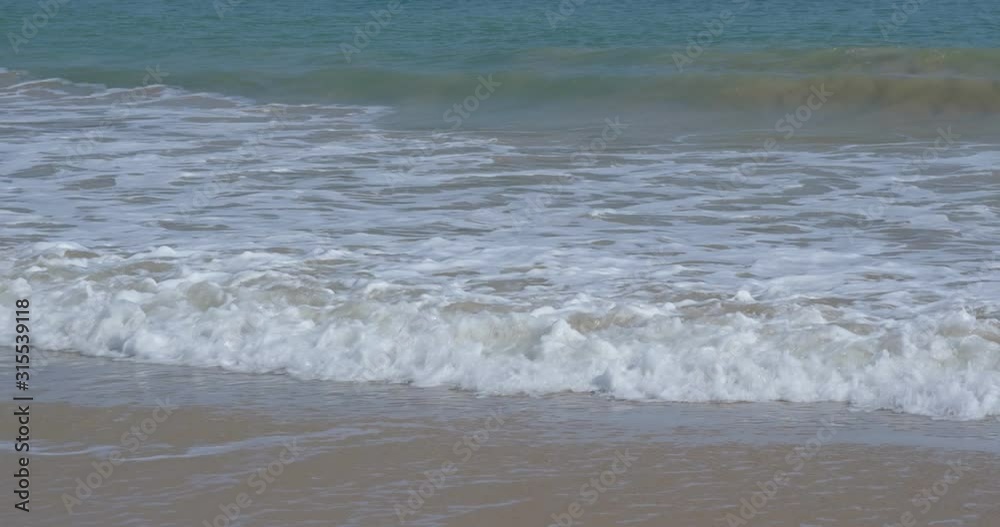 Water wave on sand beach Water wave on sand beach