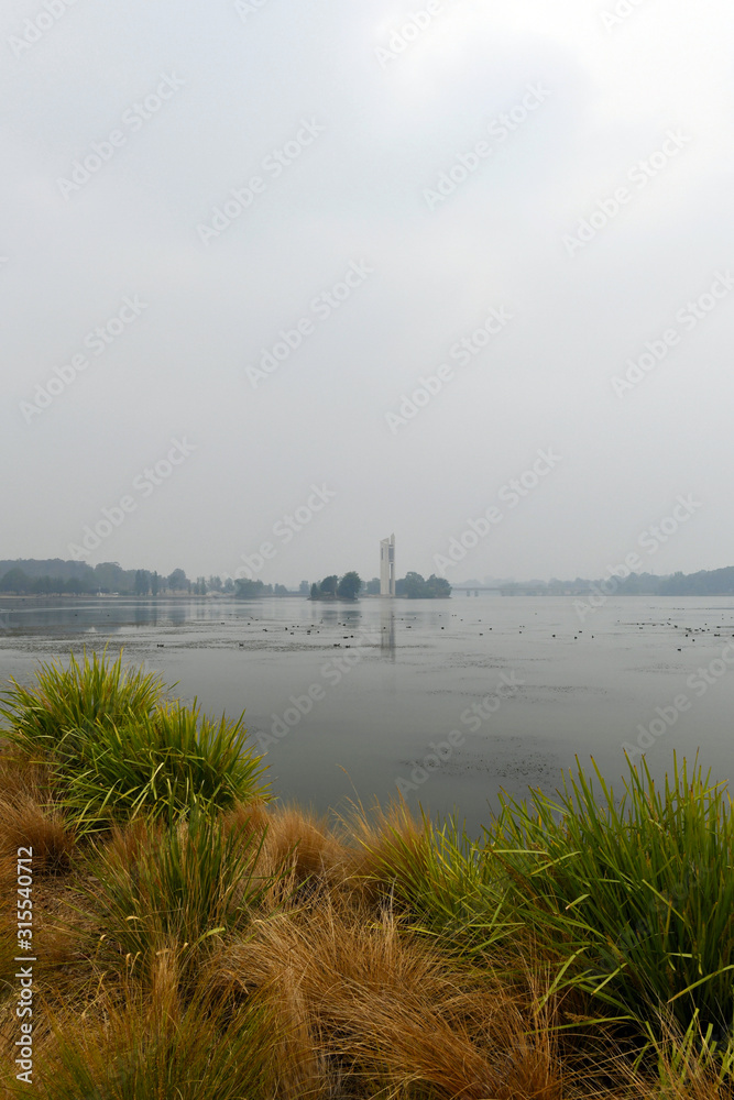 A view of Lake Burley Griffin in Canberra showing the effects of smoke haze from the bushfires of 2020