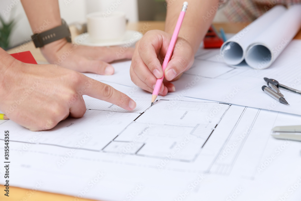 Engineer and Architect concept, Engineer Architects and Interior designer office team working with blueprints Engineer and Architect concept, Engineer Architects and Interior designer office team working with blueprints