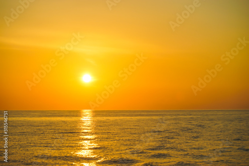 Golden sunrise and golden sea at north andaman . Sunrise over the sea near Similan Islands National Park, Phang Nga Province, Thailand, Asia. © Samruay