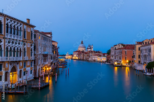 Beautiful long exposure shot of the Grand Canal and Basilica Santa Maria della Salute in Venice, Italy