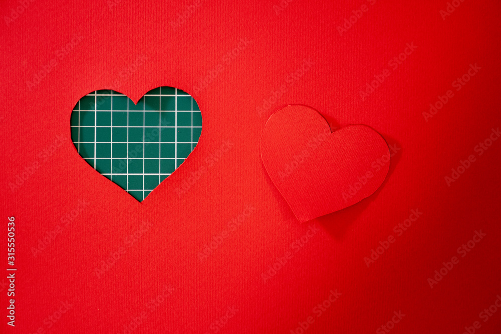 Red paper heart in a cutting board