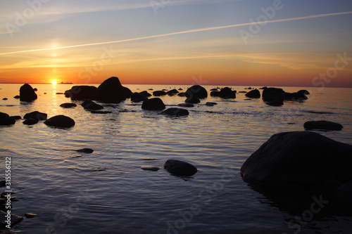 Stone coast of the Baltic Sea at sunrise © Zakharov Vitaly