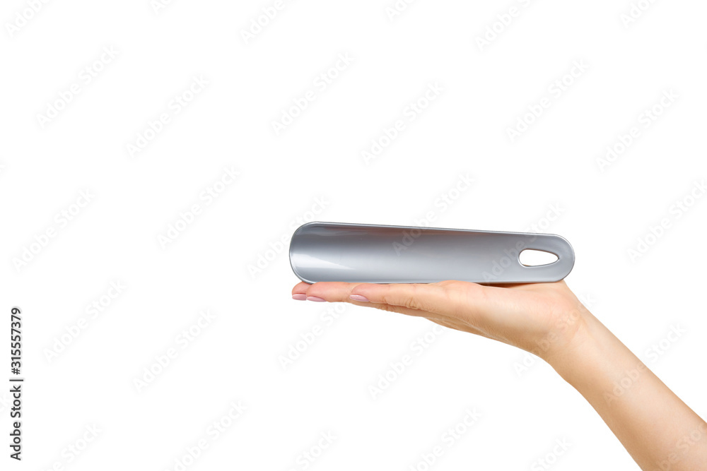Plastic gray shoe spoon. Shoehorn foot accessory. Plastic gray shoe spoon. Shoehorn foot accessory.