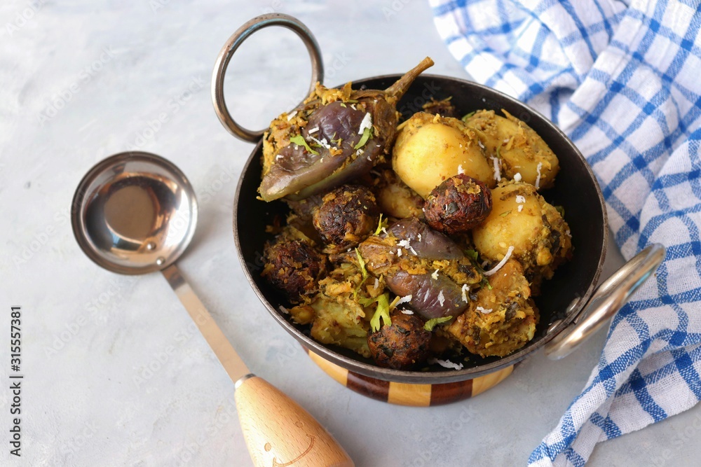 Food Traditional Indian Gujarati dish Surti Undhiyu. Its a mixed