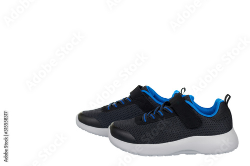 Dark sport shoes for running. Kids foot wear.