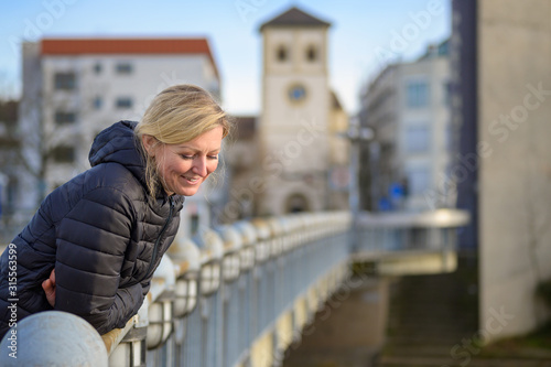 Attractive friendly blond woman in town © michaelheim