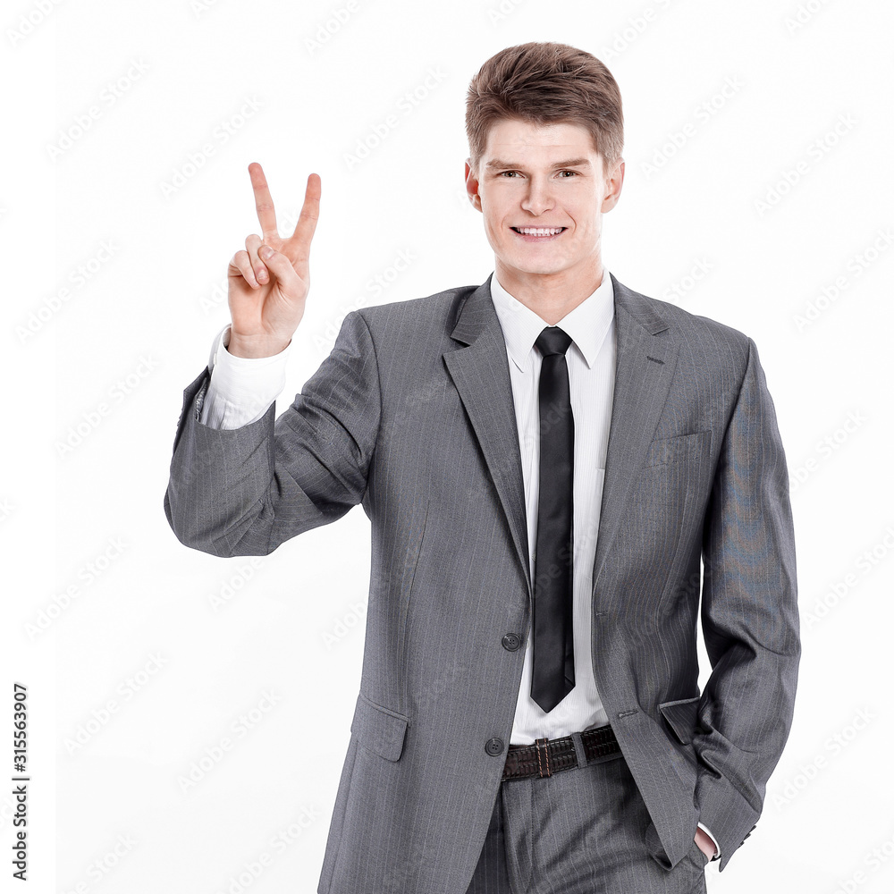 handsome businessman showing victory sign.isolated on a white background. handsome businessman showing victory sign.isolated on a white background.