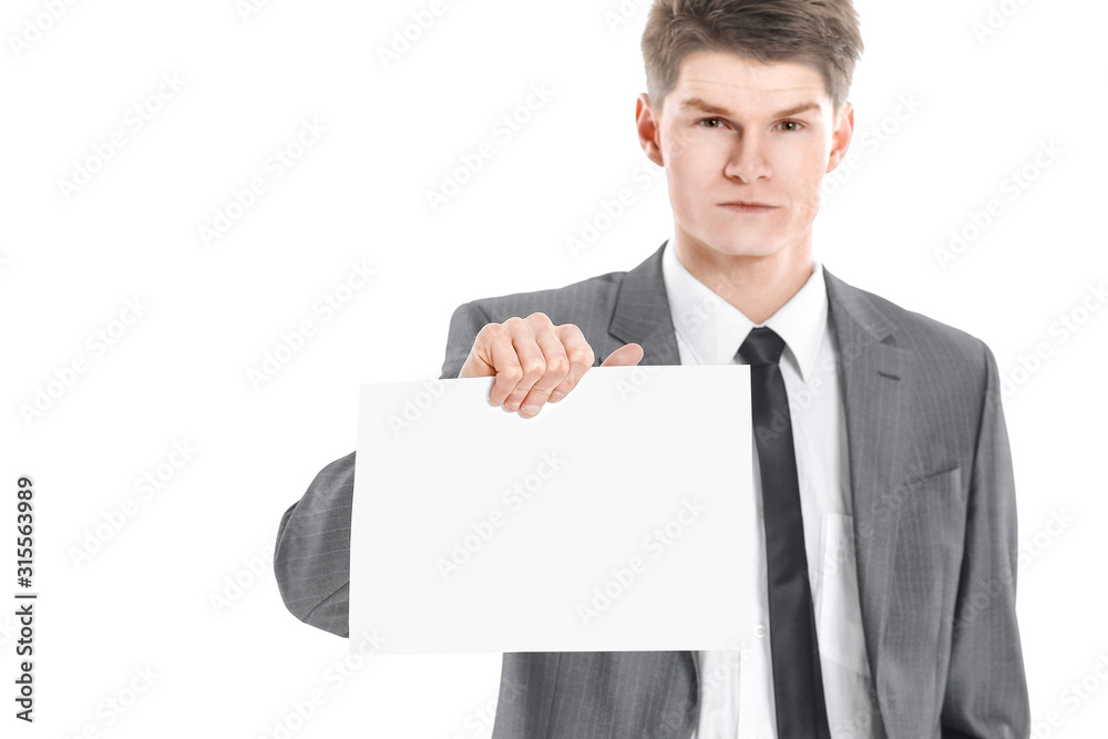 young businessman showing a blank sheet.isolated on a white young businessman showing a blank sheet.isolated on a white
