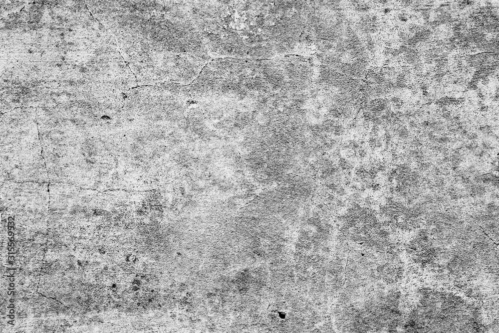 Texture of a concrete wall with cracks and scratches which can be used as a background Texture of a concrete wall with cracks and scratches which can be used as a background