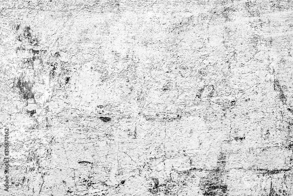 Texture of a concrete wall with cracks and scratches which can be used as a background Texture of a concrete wall with cracks and scratches which can be used as a background