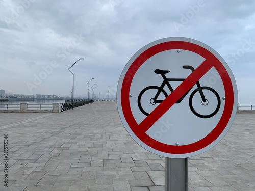 No bicycles allowed sign at city boulevard photo.