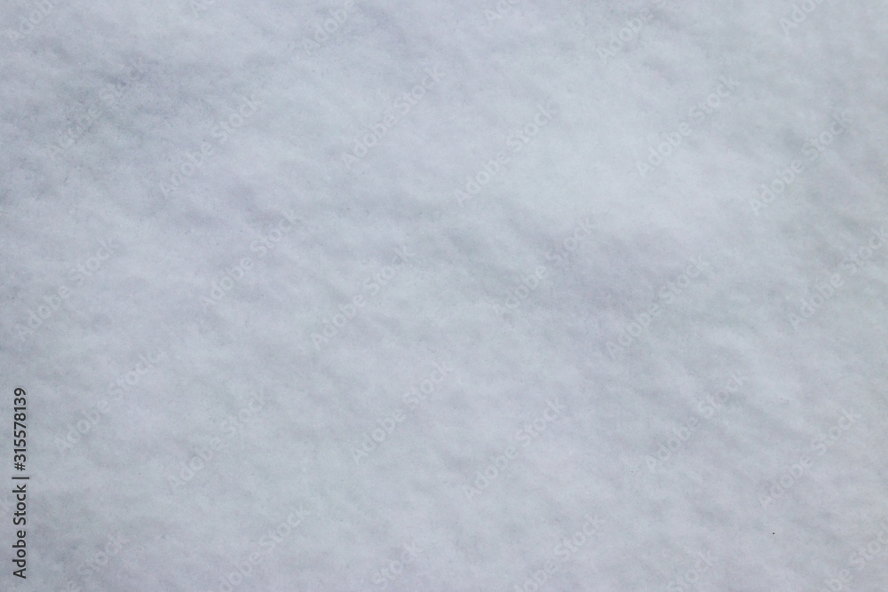 Texture of the white snow. Winter background