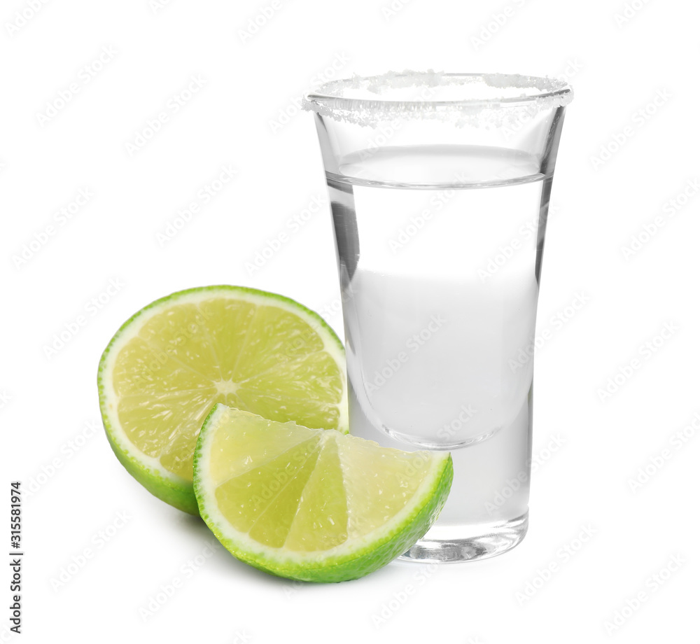 Mexican Tequila shot with salt and lime isolated on white Mexican Tequila shot with salt and lime isolated on white