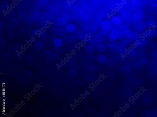 Abstract bokeh festoon on dark blue background.blue blur abstract.