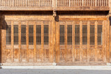 The traditional wooden doors with lattice windows,which has the style of typical architecture of southern China in the Ming and Qing Dynasties.