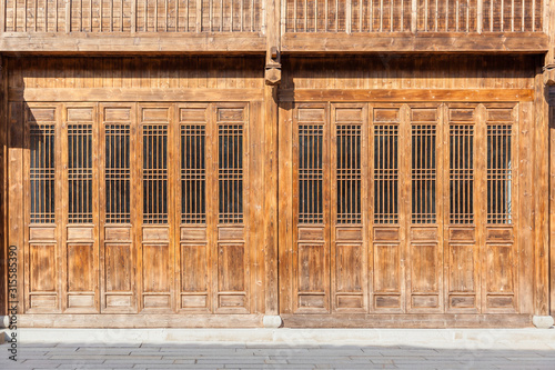 The traditional  wooden doors with lattice windows,which has the style of typical architecture of southern China in the Ming and Qing Dynasties.