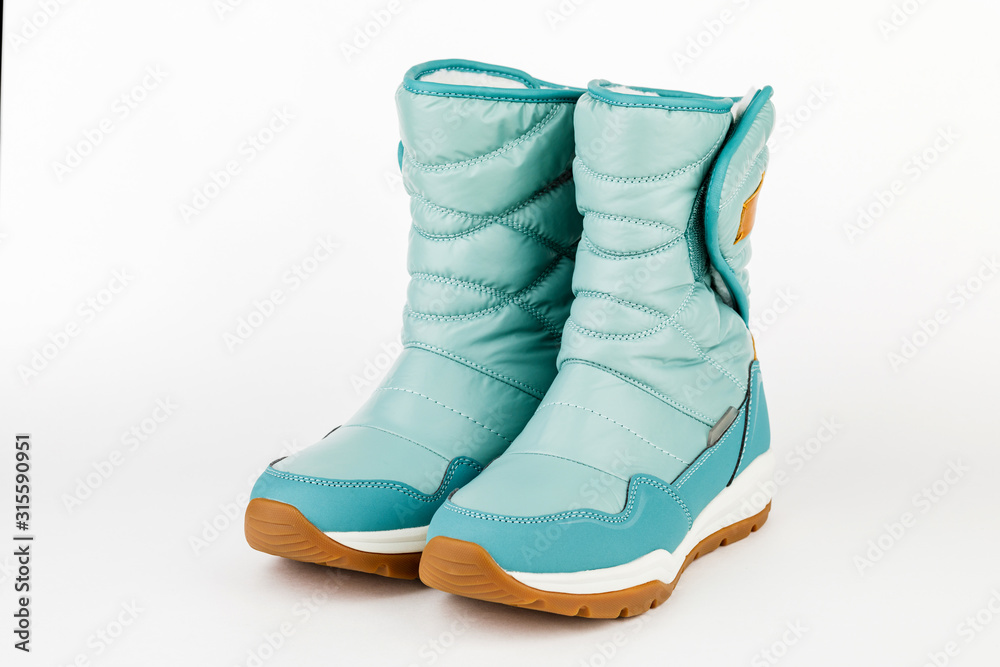 child winter blue boots on a white background child winter blue boots on a white background
