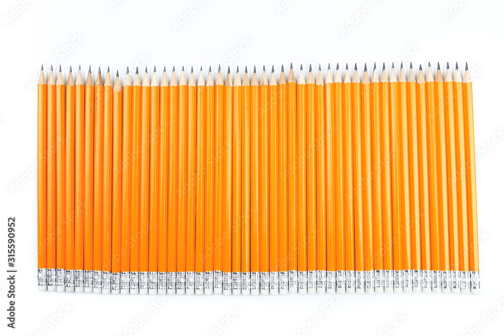 Close up view of a bunch of yellow pencils isolated on a white background. - Image Close up view of a bunch of yellow pencils isolated on a white background. - Image