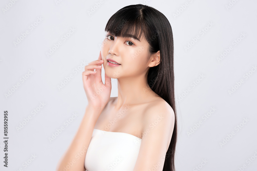 Portrait beautiful young asian woman clean fresh bare skin concept. Asian girl beauty face skincare and health wellness, Facial treatment, Perfect skin, Natural make up, on white background Portrait beautiful young asian woman clean fresh bare skin concept. Asian girl beauty face skincare and health wellness, Facial treatment, Perfect skin, Natural make up, on white background