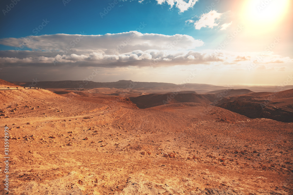 Mountain nature landscape. Desert in early morning. Beautiful sunrise in mountains. Judaean Desert. View of valley with mountains on backdrop. Nature Israel.