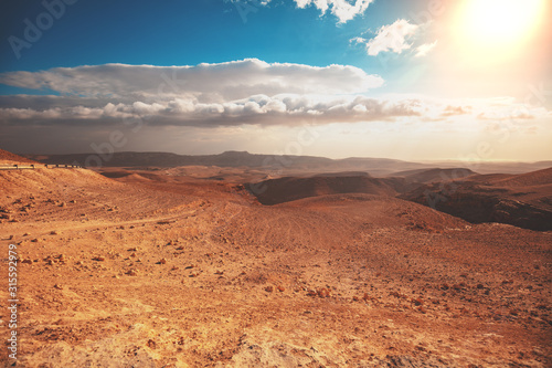 Mountain nature landscape. Desert in early morning. Beautiful sunrise in mountains. Judaean Desert. View of valley with mountains on backdrop. Nature Israel.