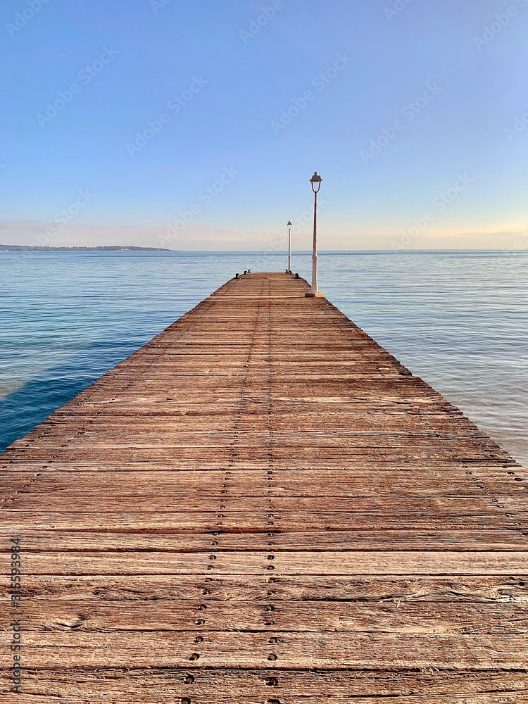 A wooden Jetty Boardwalk leading out to Sea
