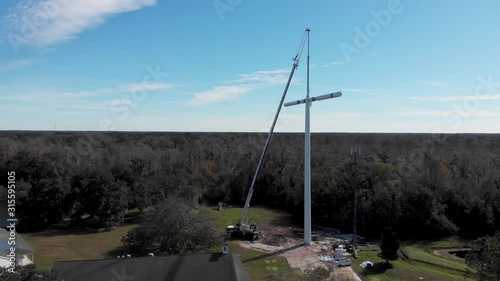 Installation of Cross-shaped Cell Phone Tower photo