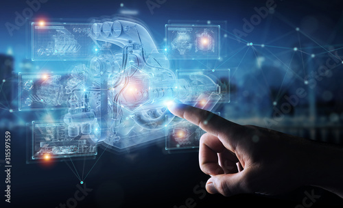 Businessman hand holding and touching wireframe holographic digital projection of an engine 3D rendering