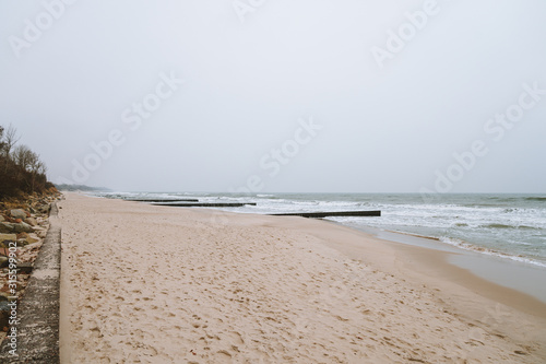 Fototapeta Naklejka Na Ścianę i Meble -  Beach on the Baltic Sea in cloudy weather without people