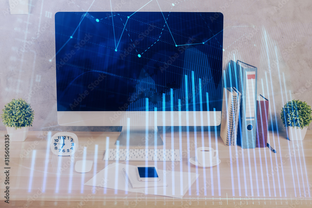 Forex graph hologram on table with computer background. Double exposure. Concept of financial markets. Forex graph hologram on table with computer background. Double exposure. Concept of financial markets.