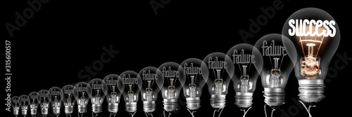 Light Bulbs with Failure and Success Concept photo