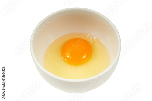 egg in a bowl isolated on white