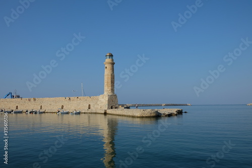 Old lighthouse near the harbor of Rethymno, Crete, Greece.